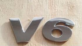 7p6853675e Volkswagen 2011-2018 Vw Touareg - Trunk Hatch Emblem / Badge V6