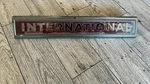 1968-1971 Ih International Red Emblem 11810-1 / 2754222-R1 Truck Scout. Fixed Price $75.00.