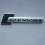 Genuine Audi Supercharged Badge Red 4F0-853-601-A-2ZZ. Fixed Price $77.87.