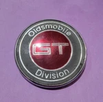 BIN47 Used Oldsmobile 1986 Cutlass Sierra Gt Front Emblem. Fixed Price $29.99.