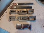 Ford 150 Pickup Truck EF-1 Xl Fender Badges. Fixed Price $25.00.