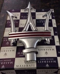 2002-17 Maserati Trident Grille Emblem With Red Lines 68337300. Fixed Price $225.00.