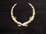 1977-1986 Cadillac Hood Wreath Nose Emblem Ornament Part# 1605417. Fixed Price $6.00.