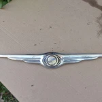 Chrysler Wing Emblem 04805988A Rear Trunk Badge. Fixed Price $12.00.