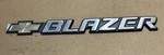 Gm 15672283 Liftgate Door Emblem -- 1995-2005 Chevy Blazer Nos Oem. Fixed Price $40.00.