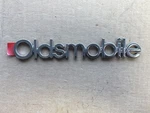 Nos Oem 1985-91 Oldsmobile Rear End Panel Emblem 20477074. Fixed Price $14.99.
