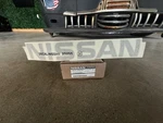 (1) Genuine Nissan Nameplate 73164-EA00A Same As Dealership Oem. Fixed Price $48.00.
