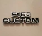 1977-1979 Ford "F150 Custom" Metal Cowl Emblem -with Pins- P/n D7TB-16702-DWC. Fixed Price $9.99.