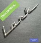 59 60 61 Studebaker Lark Script Nameplate Emblem 69104 1332235 Oem. Fixed Price $24.95.