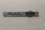 Original Used Rear Deck Trunk Emblem 4492586 For 1965 Malibu Ss. Fixed Price $25.00.