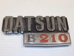 1970 - 1976 Datsun B210 Emblem Oem #79842 H6900 71 72 73 74 75. Fixed Price $50.00.