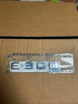 Nos Mercedes W210 E300 Rear Trunk Emblem Badge Oem A1248175715. Fixed Price $25.00.