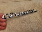 1970 1972 1973 Amc Gremlin Script Emblem Badge Oem #3632056 Nos??. Fixed Price $35.00.