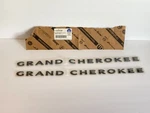2 Nos Mopar 68193410AA Jeep Front Door Name Plate Emblems Read!!!. Fixed Price $69.99.