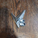 1955, 1956, 1957 Gmc Truck Fender V8 Emblem (single). Fixed Price $120.00.