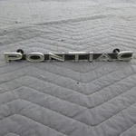 1965-1966 Pontiac Front Grille Emblem Script Tempest Lemans Gto 9780163 Oem. Fixed Price $25.00.