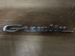 1970 1971 1972 1973 Amc Gremlin Script Emblem Name Plate Oem 3632056. Fixed Price $22.99.