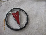 Nos 1991-1995 Pontiac Bonneville Plastic Grill Ornament-part No. 16503785. Fixed Price $15.00.