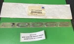 New Genuine Mopar Dodge Nameplate 05113300AA. Fixed Price $68.00.