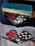 Nos New Gm 3792000 1962-63 Chevrolet Corvette Front Fender Cross Flags Pair. Fixed Price $100.00.