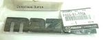 "1984-1985 Mazda RX-7 Front Bumper Black Emblem Logo Oem F023-51-770A. Fixed Price $32.00.