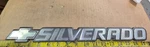 Chevy Silverado Circa '04 Silver/black Bowtie Emblem 15153105 X168). Fixed Price $7.00.