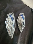 2 Buick Three Shield Emblem Badge. Fixed Price $30.00.