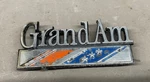 1973 1974 Pontiac Grand Trunk Emblem Nameplate Script 1975 Oem Appliqu. Fixed Price $33.24.