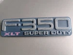 Used 99-04 Ford F-350 Super Duty Xlt Fender Emblem Nameplate F81Z-16720-SA Oem. Fixed Price $12.00.