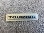 Mopar Touring Emblem Badge 04857974AA Oem New Old Stock Chrysler Pacifica. Fixed Price $27.99.