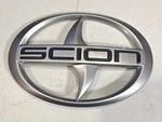 Toyota Scion Hatch Emblem Oem #75441-12A20. Fixed Price $24.95.