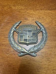1992-1994 Cadillac Eldorado Gold Side Sail Panel Wreath Crest Emblem 20725641. Fixed Price $15.00.