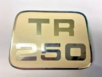 Triumph TR250 Cream Enamel & Chrome Bonnet Badge , 622278. Fixed Price $63.30.