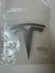 New Oem 24-26 Genuine Tesla Model 3 Front T-badge Chrome 1694511-00-C. Fixed Price $25.00.