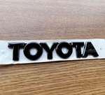 Toyota Emblem Sticker Logo Mark Decal Black 12.6CM X 2.4CM. Fixed Price $73.50.