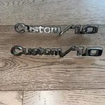Chevrolet C10 Fender Emblems PT-3944759 CUSTOM/10 Chevy Truck Badges Oem. Fixed Price $60.00.