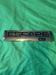 2001-2004 Ford Escape Xlt Emblem Badge Oem Chrome Rear Tailgate. Fixed Price $15.00.