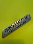 13 15 Mazda CX5 Sky Activ Technology Emblem KDS351771. Fixed Price $14.50.