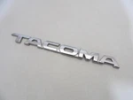 2005 2006 2007 2008 2009 2010-2015 Toyota Tacoma Front Door Nameplate Emblem Oem. Fixed Price $14.99.