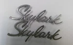 1964-65 Buick Skylark Emblem Script Oem 4420108 Pair. Fixed Price $40.00.