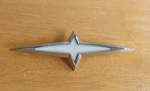 Pontiac 1960 Star Chief Rear Fender Emblem Nos 4799755. Fixed Price $150.00.