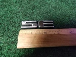 22657237 Oem Gm Emblem Plate Badge Se Front Door 1999-2002 Pontiac Grand Am 6S4. Fixed Price $11.99.