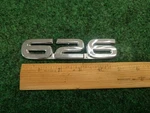 00 01 02 Mazda 626 Rear Lid Emblem Logo Badge Sign Symbol Oem Name Plate 2S8. Fixed Price $15.99.