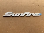 Nos Oem 1995-98 Pontiac Sunfire Door Emblem 22596470. Fixed Price $9.95.