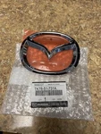 TK78-51-731A Mazda Rear Emblem. Fixed Price $70.00.
