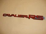 1991 - 1994 Chevrolet Cavalier Rs Red Emblem New Oem. Fixed Price $22.00.