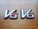 1991 Isuzu Trooper - Front Fender V6 Emblem Pair. Fixed Price $39.90.