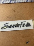 New 2007-2012 Hyundai Santa Fe Rear Trunk Lid Nameplate Emblem Oem 86310 2B000. Fixed Price $18.25.