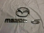 203-2008 Mazda Trunk Emblem Set 910.MZ1S07. Fixed Price $44.37.