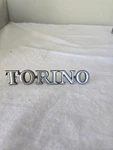 Nos Oem Ford Torino D20B 6542528BA Emblem Script Badge. Fixed Price $10.00.